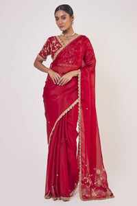 Shop red embroidered organza saree online in USA with designer saree blouse. Make a fashion statement on festive occasions and weddings with designer sarees, designer suits, Indian dresses, Anarkali suits, palazzo suits, designer gowns, sharara suits, embroidered sarees from Pure Elegance Indian fashion store in USA.-full view