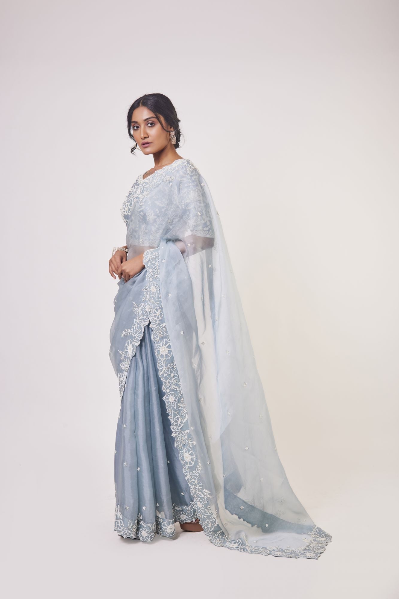 Buy doctor blue embroidered organza saree online in USA with designer saree blouse. Make a fashion statement on festive occasions and weddings with designer sarees, designer suits, Indian dresses, Anarkali suits, palazzo suits, designer gowns, sharara suits, embroidered sarees from Pure Elegance Indian fashion store in USA.-pallu