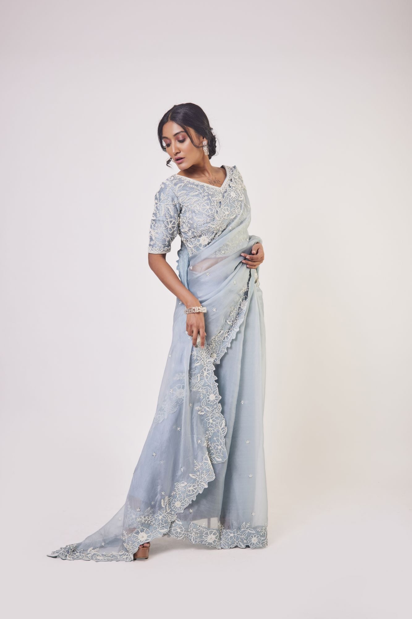 Buy doctor blue embroidered organza saree online in USA with designer saree blouse. Make a fashion statement on festive occasions and weddings with designer sarees, designer suits, Indian dresses, Anarkali suits, palazzo suits, designer gowns, sharara suits, embroidered sarees from Pure Elegance Indian fashion store in USA.-right