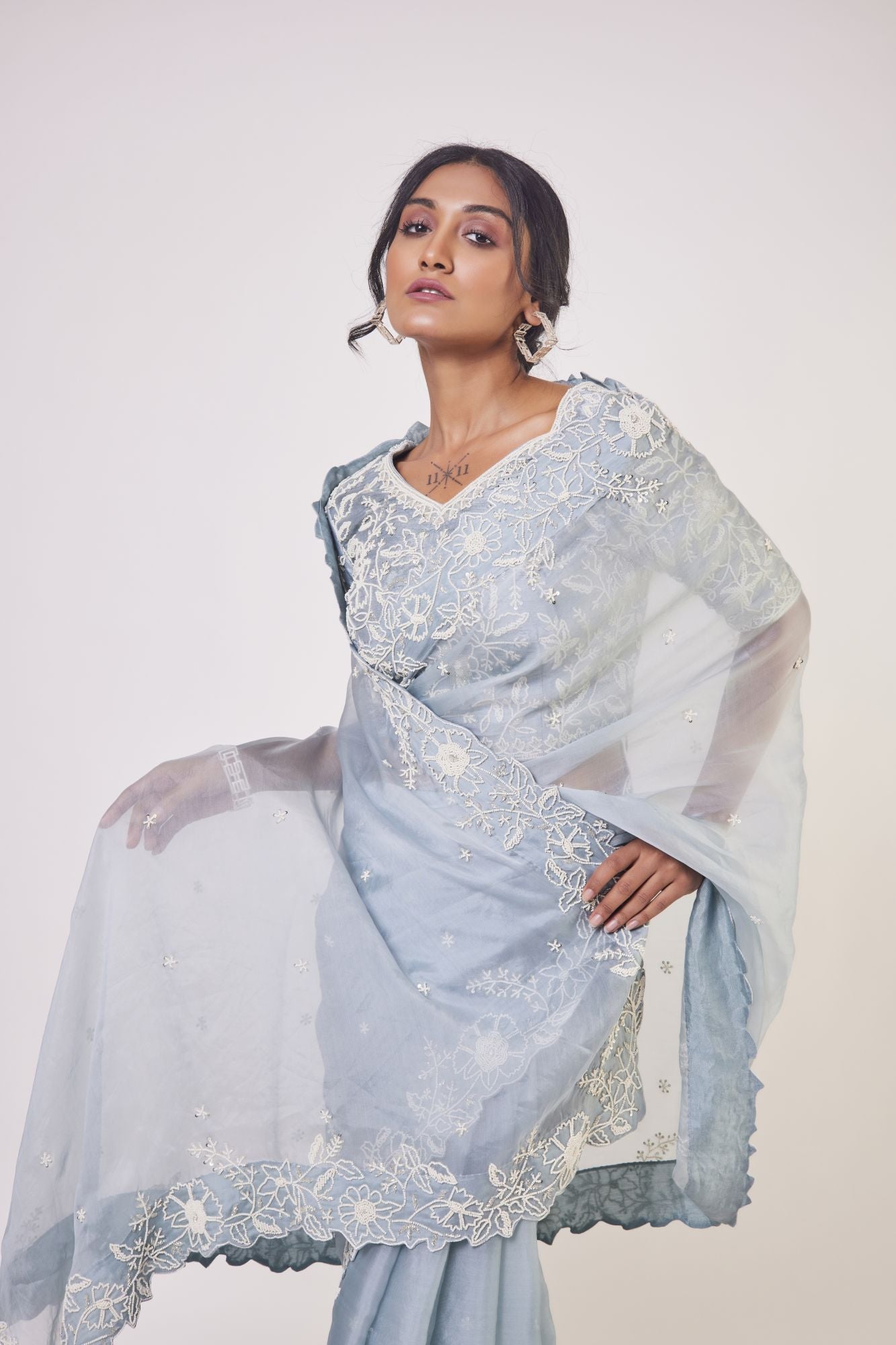 Buy doctor blue embroidered organza saree online in USA with designer saree blouse. Make a fashion statement on festive occasions and weddings with designer sarees, designer suits, Indian dresses, Anarkali suits, palazzo suits, designer gowns, sharara suits, embroidered sarees from Pure Elegance Indian fashion store in USA.-closeup