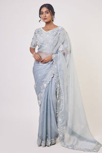 Buy doctor blue embroidered organza saree online in USA with designer saree blouse. Make a fashion statement on festive occasions and weddings with designer sarees, designer suits, Indian dresses, Anarkali suits, palazzo suits, designer gowns, sharara suits, embroidered sarees from Pure Elegance Indian fashion store in USA.-full view