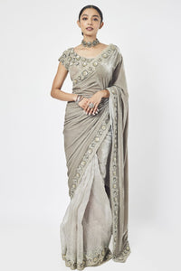 Buy grey embroidered organza and velvet saree online in USA with saree blouse. Make a fashion statement on festive occasions and weddings with designer sarees, designer suits, Indian dresses, Anarkali suits, palazzo suits, designer gowns, sharara suits, embroidered sarees from Pure Elegance Indian fashion store in USA.-full view