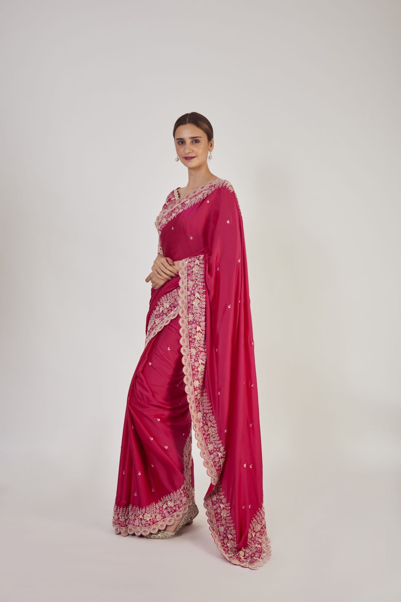 Shop rani pink embroidered raw silk saree online in USA with saree blouse. Make a fashion statement on festive occasions and weddings with designer sarees, designer suits, Indian dresses, Anarkali suits, palazzo suits, designer gowns, sharara suits, embroidered sarees from Pure Elegance Indian fashion store in USA.-pallu