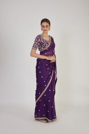 Buy beautiful purple zardozi work organza saree online in USA with saree blouse. Make a fashion statement on festive occasions and weddings with designer sarees, designer suits, Indian dresses, Anarkali suits, palazzo suits, designer gowns, sharara suits, embroidered sarees from Pure Elegance Indian fashion store in USA.-right