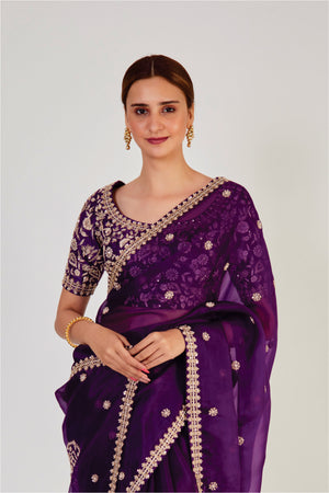 Buy beautiful purple zardozi work organza saree online in USA with saree blouse. Make a fashion statement on festive occasions and weddings with designer sarees, designer suits, Indian dresses, Anarkali suits, palazzo suits, designer gowns, sharara suits, embroidered sarees from Pure Elegance Indian fashion store in USA.-closeup