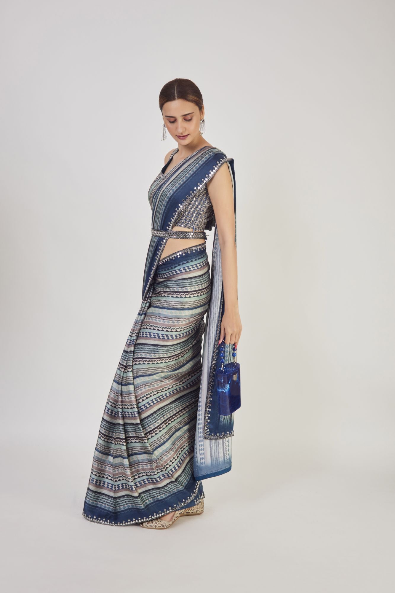 Buy blue cutdana and mirror work handloom saree online in USA with saree blouse. Make a fashion statement on festive occasions and weddings with designer sarees, designer suits, Indian dresses, Anarkali suits, palazzo suits, designer gowns, sharara suits, embroidered sarees from Pure Elegance Indian fashion store in USA.-pallu