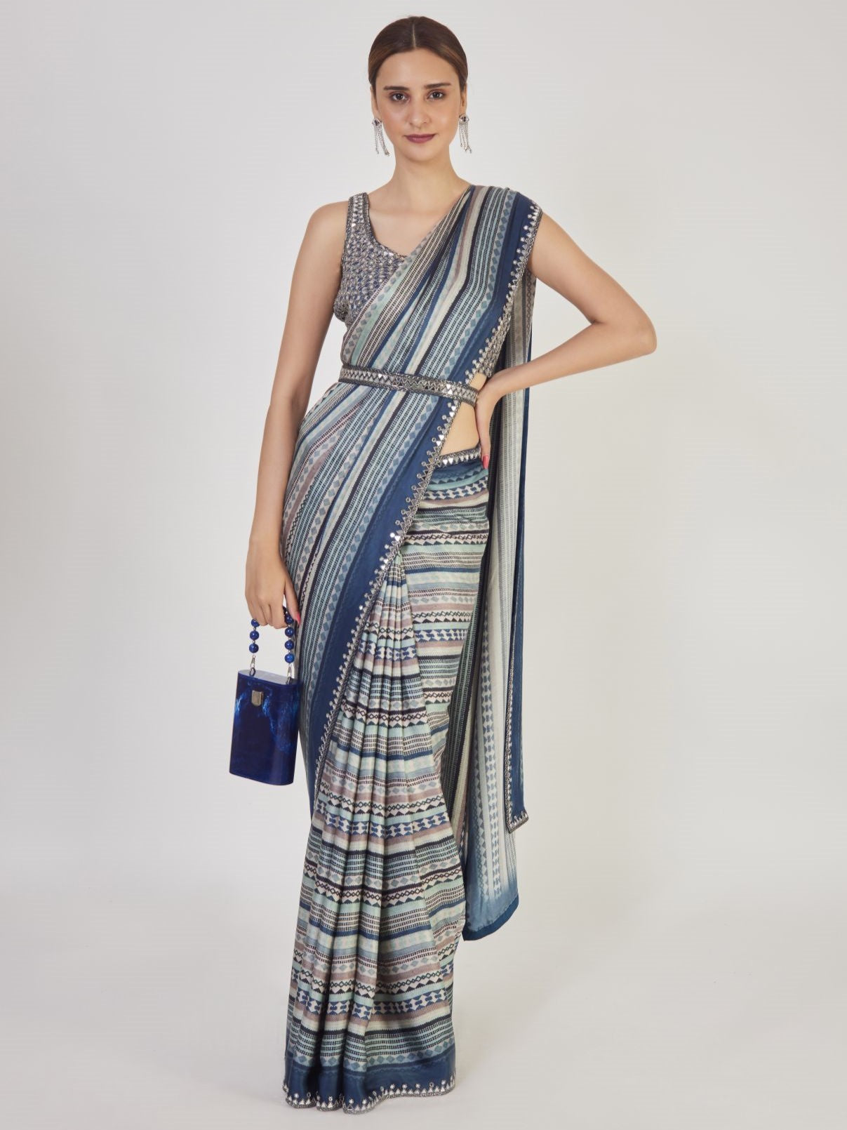 Buy blue cutdana and mirror work handloom saree online in USA with saree blouse. Make a fashion statement on festive occasions and weddings with designer sarees, designer suits, Indian dresses, Anarkali suits, palazzo suits, designer gowns, sharara suits, embroidered sarees from Pure Elegance Indian fashion store in USA.-full view