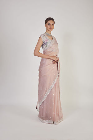 Shop cream embroidered organza saree online in USA with saree blouse. Make a fashion statement on festive occasions and weddings with designer sarees, designer suits, Indian dresses, Anarkali suits, palazzo suits, designer gowns, sharara suits, embroidered sarees from Pure Elegance Indian fashion store in USA.-right
