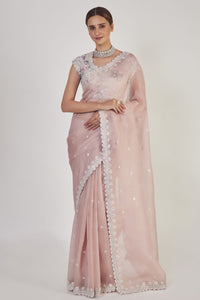 Shop cream embroidered organza saree online in USA with saree blouse. Make a fashion statement on festive occasions and weddings with designer sarees, designer suits, Indian dresses, Anarkali suits, palazzo suits, designer gowns, sharara suits, embroidered sarees from Pure Elegance Indian fashion store in USA.-full view