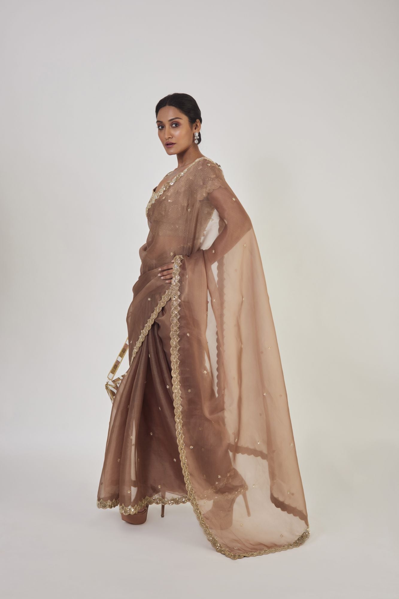 Buy beautiful light coffee brown sequin work organza saree online in USA with saree blouse. Make a fashion statement on festive occasions and weddings with designer sarees, designer suits, Indian dresses, Anarkali suits, palazzo suits, designer gowns, sharara suits, embroidered sarees from Pure Elegance Indian fashion store in USA.-pallu