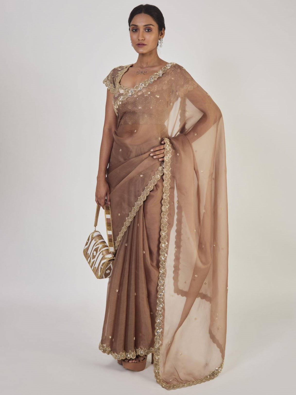 Buy beautiful light coffee brown sequin work organza saree online in USA with saree blouse. Make a fashion statement on festive occasions and weddings with designer sarees, designer suits, Indian dresses, Anarkali suits, palazzo suits, designer gowns, sharara suits, embroidered sarees from Pure Elegance Indian fashion store in USA.-full view