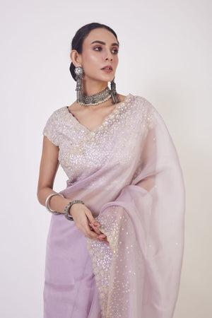 Buy beautiful onion pink embroidered organza saree online in USA with saree blouse. Make a fashion statement on festive occasions and weddings with designer sarees, designer suits, Indian dresses, Anarkali suits, palazzo suits, designer gowns, sharara suits, embroidered sarees from Pure Elegance Indian fashion store in USA.-closeup