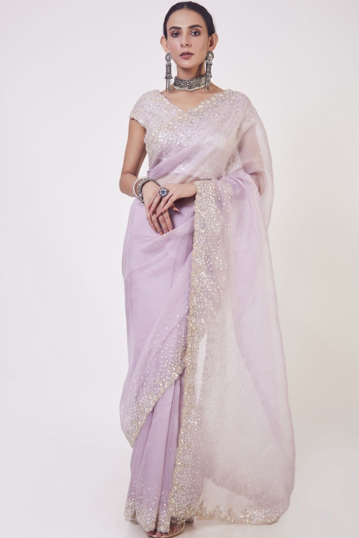 Buy beautiful onion pink embroidered organza saree online in USA with saree blouse. Make a fashion statement on festive occasions and weddings with designer sarees, designer suits, Indian dresses, Anarkali suits, palazzo suits, designer gowns, sharara suits, embroidered sarees from Pure Elegance Indian fashion store in USA.-full view