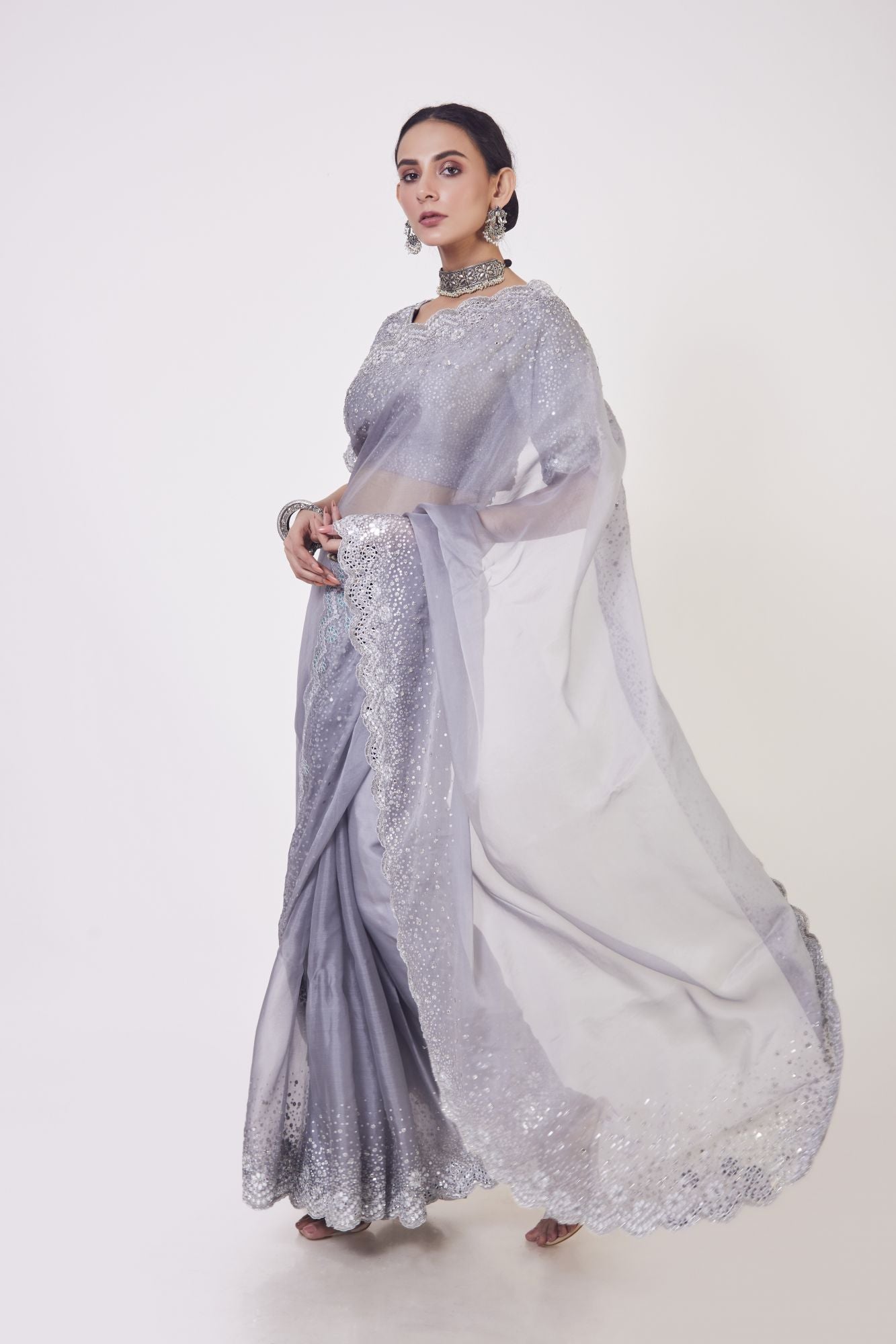 Buy stunning grey embroidered organza saree online in USA with saree blouse. Make a fashion statement on festive occasions and weddings with designer sarees, designer suits, Indian dresses, Anarkali suits, palazzo suits, designer gowns, sharara suits, embroidered sarees from Pure Elegance Indian fashion store in USA.-pallu