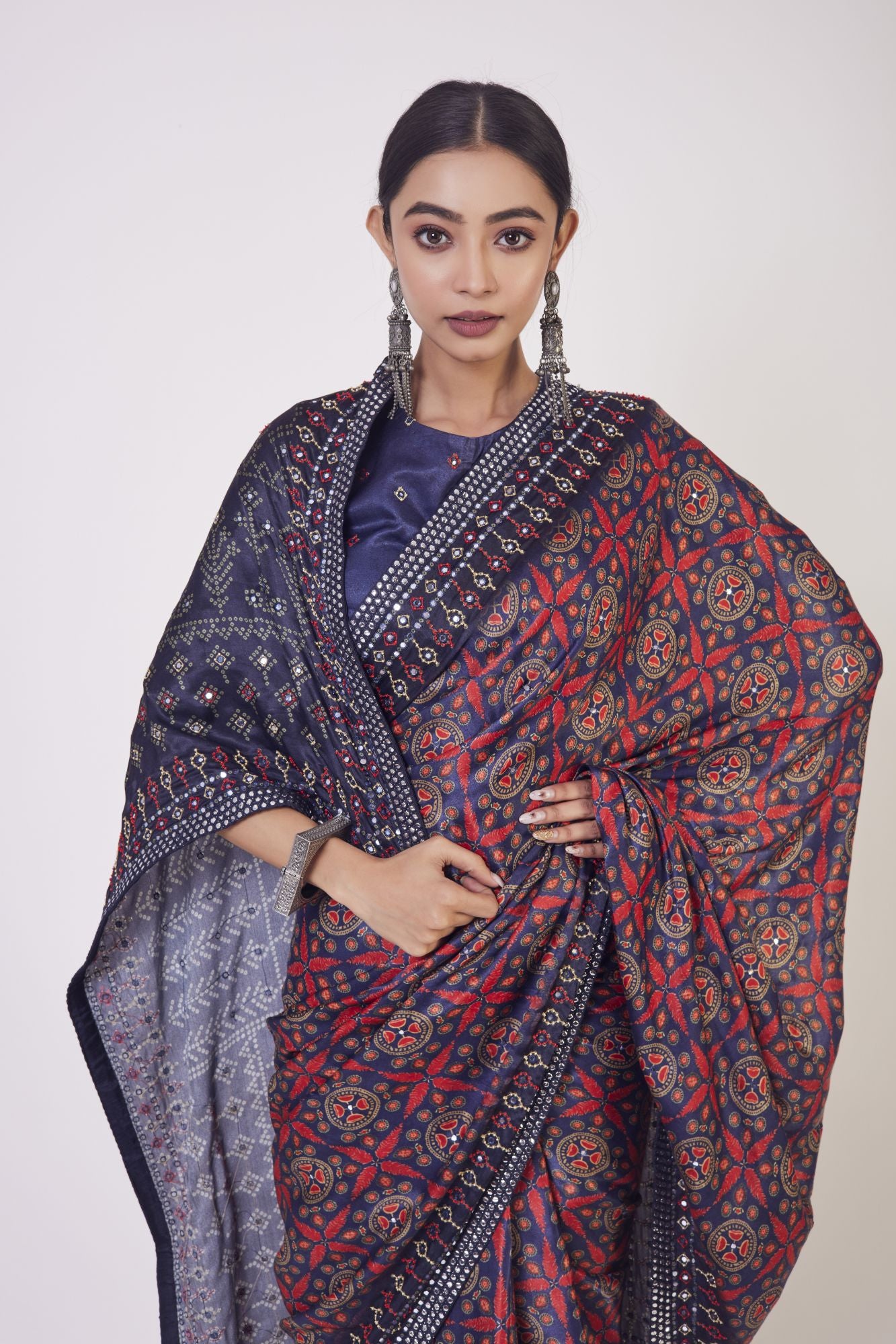 Shop beautiful blue and red printed bead work handloom saree online in USA with saree blouse. Make a fashion statement on festive occasions and weddings with designer sarees, designer suits, Indian dresses, Anarkali suits, palazzo suits, designer gowns, sharara suits, embroidered sarees from Pure Elegance Indian fashion store in USA.-closeup