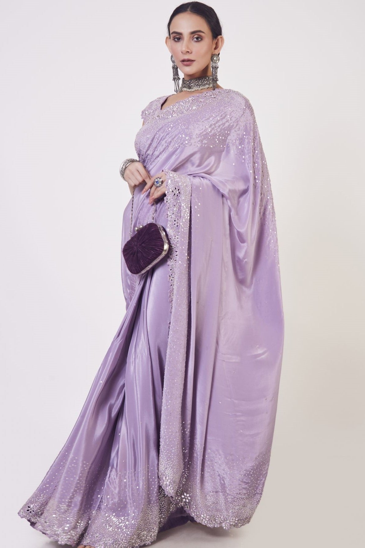 Buy beautiful lilac sequin and mirror work crepe saree online in USA. Make a fashion statement on festive occasions and weddings with designer sarees, designer suits, Indian dresses, Anarkali suits, palazzo suits, designer gowns, sharara suits, embroidered sarees from Pure Elegance Indian fashion store in USA.-full view