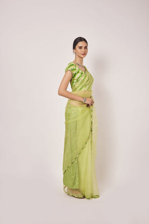 Buy pista green cutdana and pearl work organza sari online in USA. Make a fashion statement on festive occasions and weddings with designer sarees, designer suits, Indian dresses, Anarkali suits, palazzo suits, designer gowns, sharara suits, embroidered sarees from Pure Elegance Indian fashion store in USA.-right