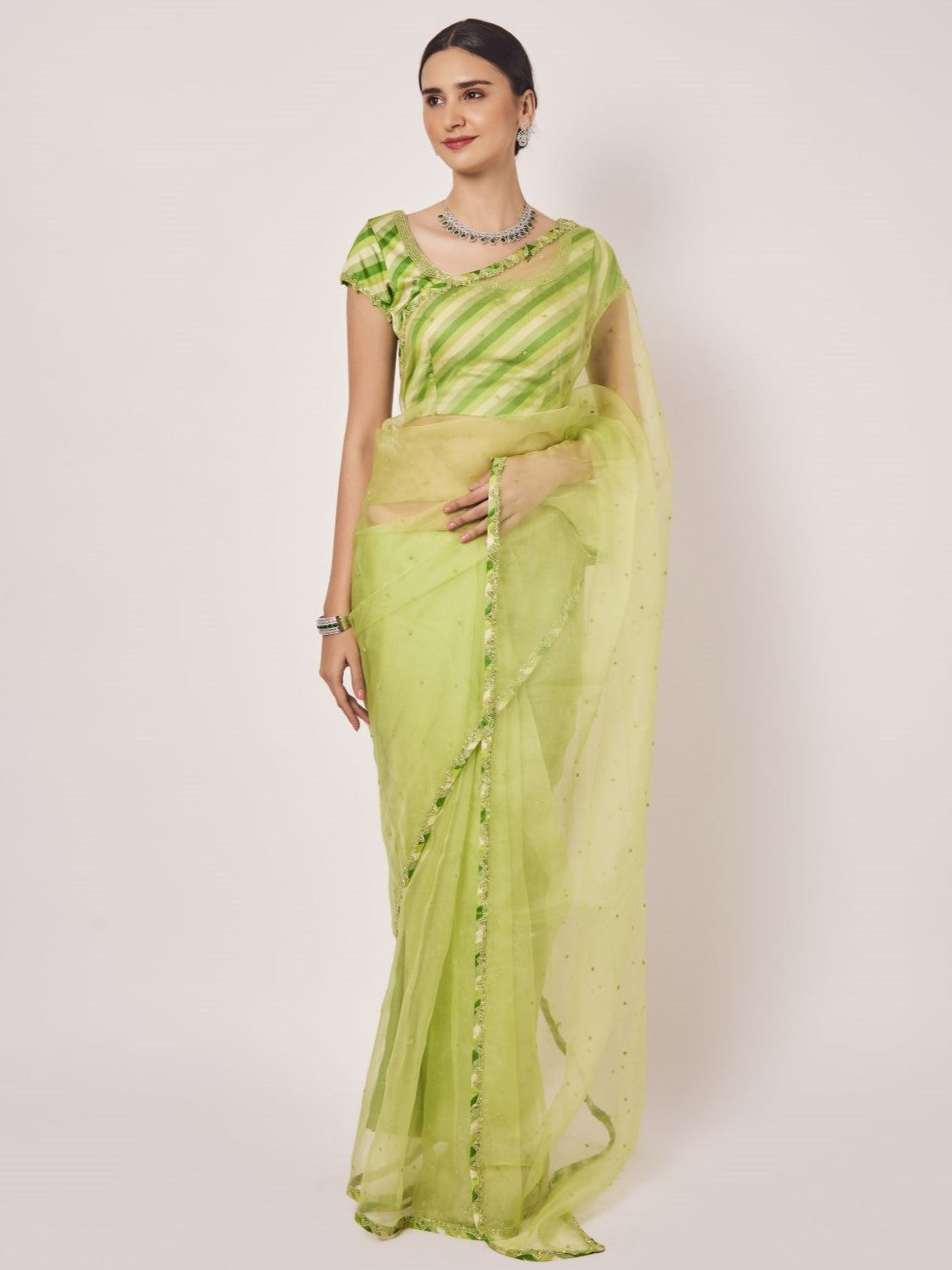 Buy pista green cutdana and pearl work organza sari online in USA. Make a fashion statement on festive occasions and weddings with designer sarees, designer suits, Indian dresses, Anarkali suits, palazzo suits, designer gowns, sharara suits, embroidered sarees from Pure Elegance Indian fashion store in USA.-full view