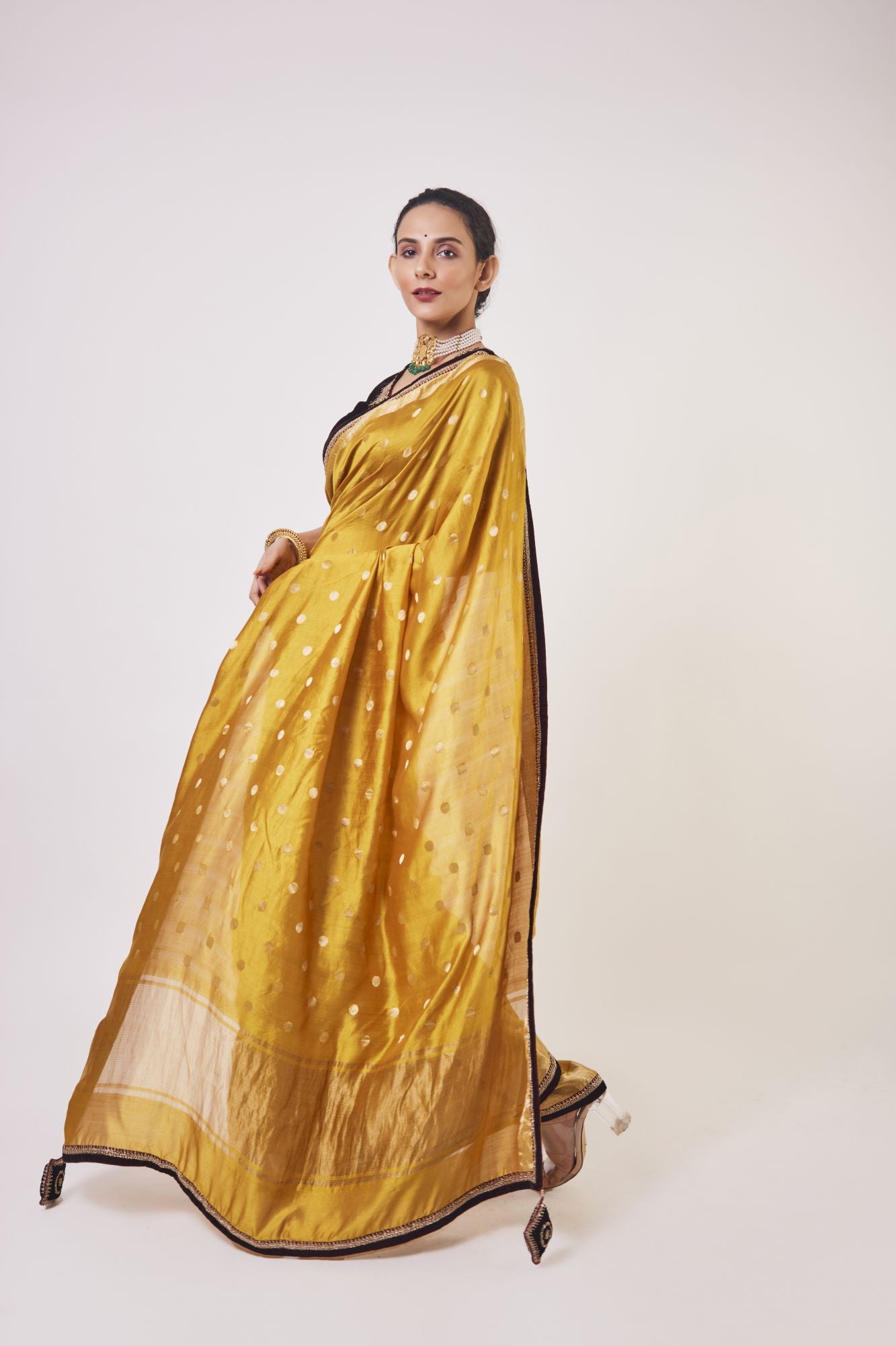 Shop mustard tikki work handloom sari online in USA with wine color blouse. Make a fashion statement on festive occasions and weddings with designer sarees, designer suits, Indian dresses, Anarkali suits, palazzo suits, designer gowns, sharara suits, embroidered sarees from Pure Elegance Indian fashion store in USA.-pallu