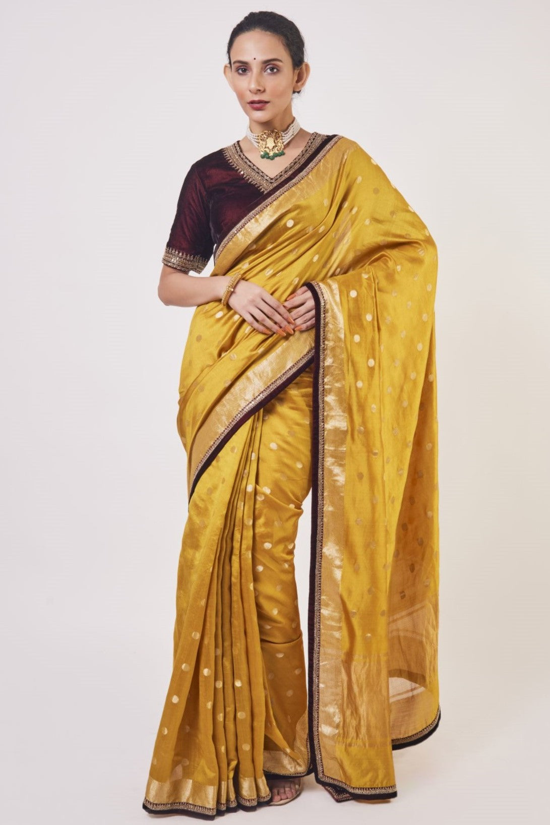 Shop mustard tikki work handloom sari online in USA with wine color blouse. Make a fashion statement on festive occasions and weddings with designer sarees, designer suits, Indian dresses, Anarkali suits, palazzo suits, designer gowns, sharara suits, embroidered sarees from Pure Elegance Indian fashion store in USA.-full view