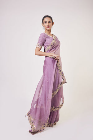 Buy beautiful lavender embroidered organza sari online in USA with blouse. Make a fashion statement on festive occasions and weddings with designer sarees, designer suits, Indian dresses, Anarkali suits, palazzo suits, designer gowns, sharara suits, embroidered sarees from Pure Elegance Indian fashion store in USA.-side