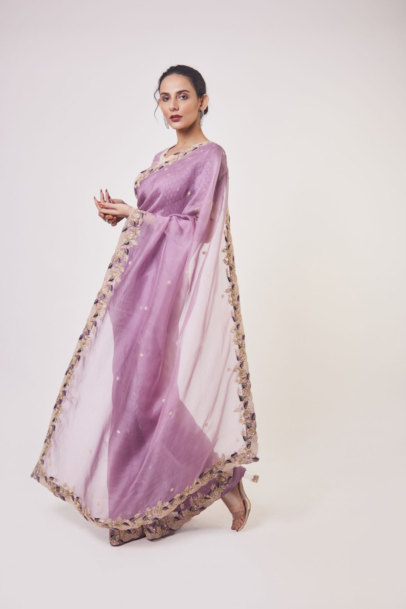 Buy beautiful lavender embroidered organza sari online in USA with blouse. Make a fashion statement on festive occasions and weddings with designer sarees, designer suits, Indian dresses, Anarkali suits, palazzo suits, designer gowns, sharara suits, embroidered sarees from Pure Elegance Indian fashion store in USA.-pallu
