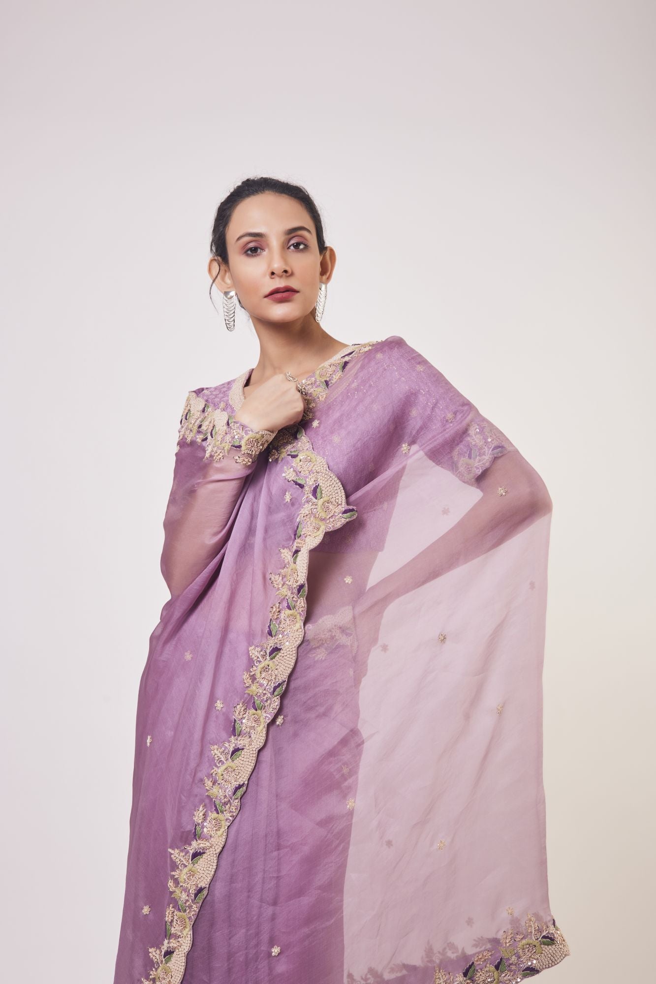 Buy beautiful lavender embroidered organza sari online in USA with blouse. Make a fashion statement on festive occasions and weddings with designer sarees, designer suits, Indian dresses, Anarkali suits, palazzo suits, designer gowns, sharara suits, embroidered sarees from Pure Elegance Indian fashion store in USA.-closeup