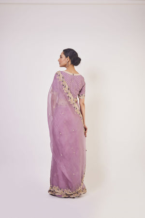 Buy beautiful lavender embroidered organza sari online in USA with blouse. Make a fashion statement on festive occasions and weddings with designer sarees, designer suits, Indian dresses, Anarkali suits, palazzo suits, designer gowns, sharara suits, embroidered sarees from Pure Elegance Indian fashion store in USA.-back