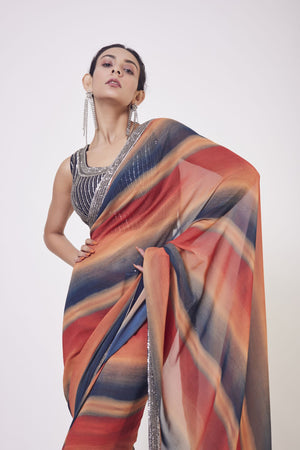 Shop beautiful multicolor embroidered georgette sari online in USA with blouse. Make a fashion statement on festive occasions and weddings with designer sarees, designer suits, Indian dresses, Anarkali suits, palazzo suits, designer gowns, sharara suits, embroidered sarees from Pure Elegance Indian fashion store in USA.-closeup