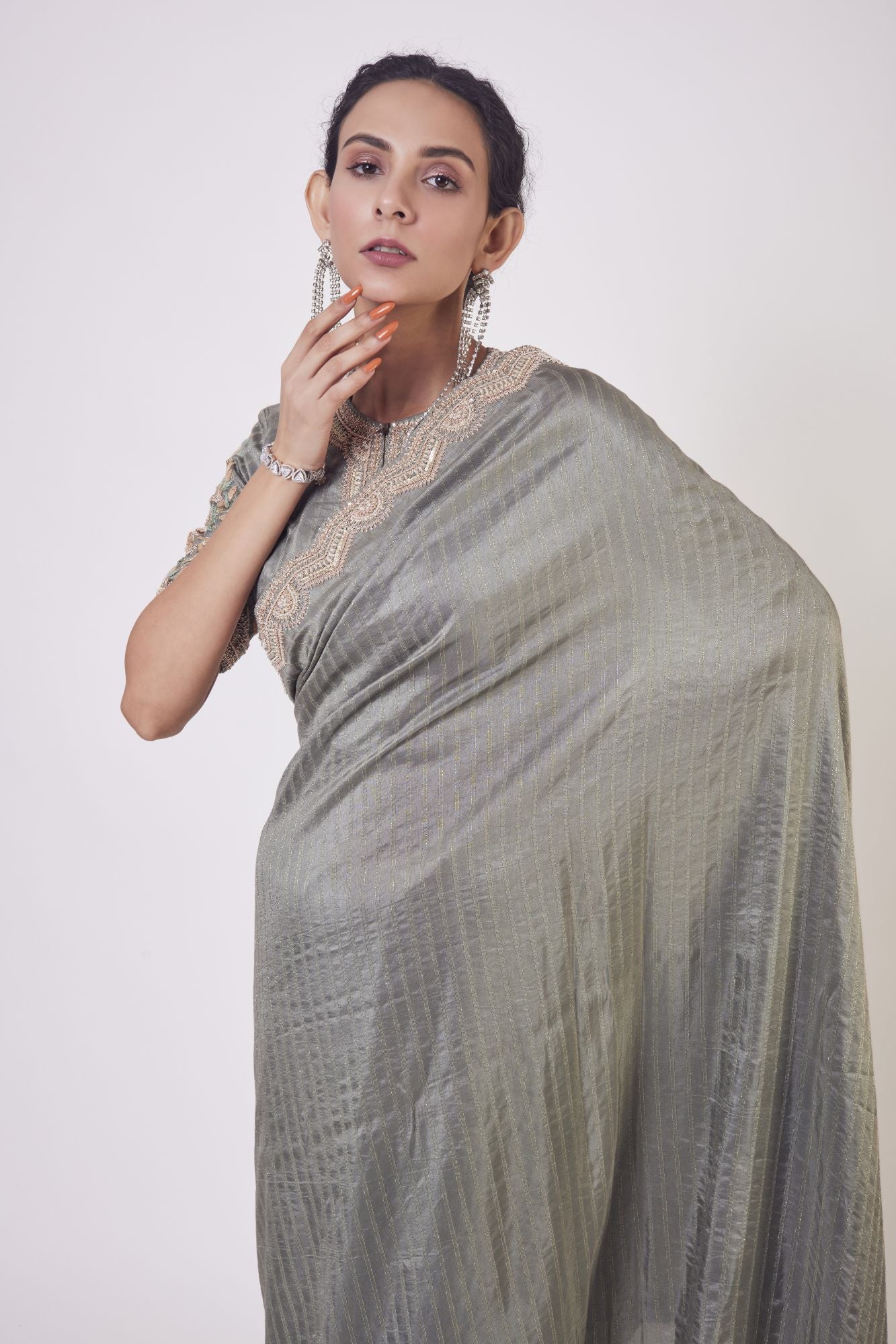Buy grey zardozi embroidery Russian fabric sari online in USA with blouse. Make a fashion statement on festive occasions and weddings with designer sarees, designer suits, Indian dresses, Anarkali suits, palazzo suits, designer gowns, sharara suits, embroidered sarees from Pure Elegance Indian fashion store in USA.-closeup