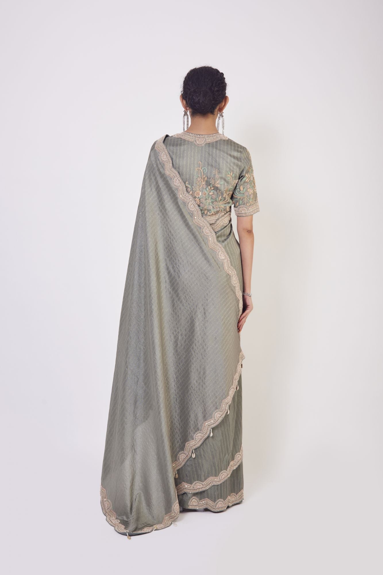 Buy grey zardozi embroidery Russian fabric sari online in USA with blouse. Make a fashion statement on festive occasions and weddings with designer sarees, designer suits, Indian dresses, Anarkali suits, palazzo suits, designer gowns, sharara suits, embroidered sarees from Pure Elegance Indian fashion store in USA.-back