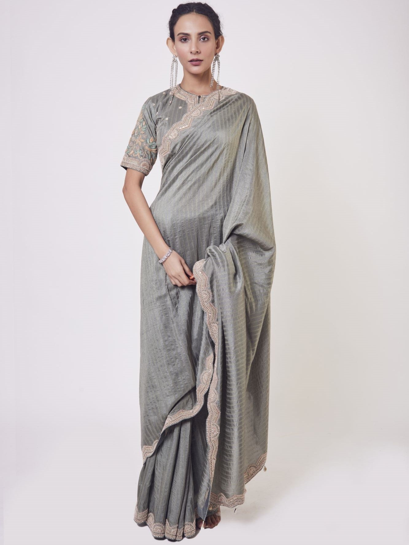 Buy grey zardozi embroidery Russian fabric sari online in USA with blouse. Make a fashion statement on festive occasions and weddings with designer sarees, designer suits, Indian dresses, Anarkali suits, palazzo suits, designer gowns, sharara suits, embroidered sarees from Pure Elegance Indian fashion store in USA.-full view