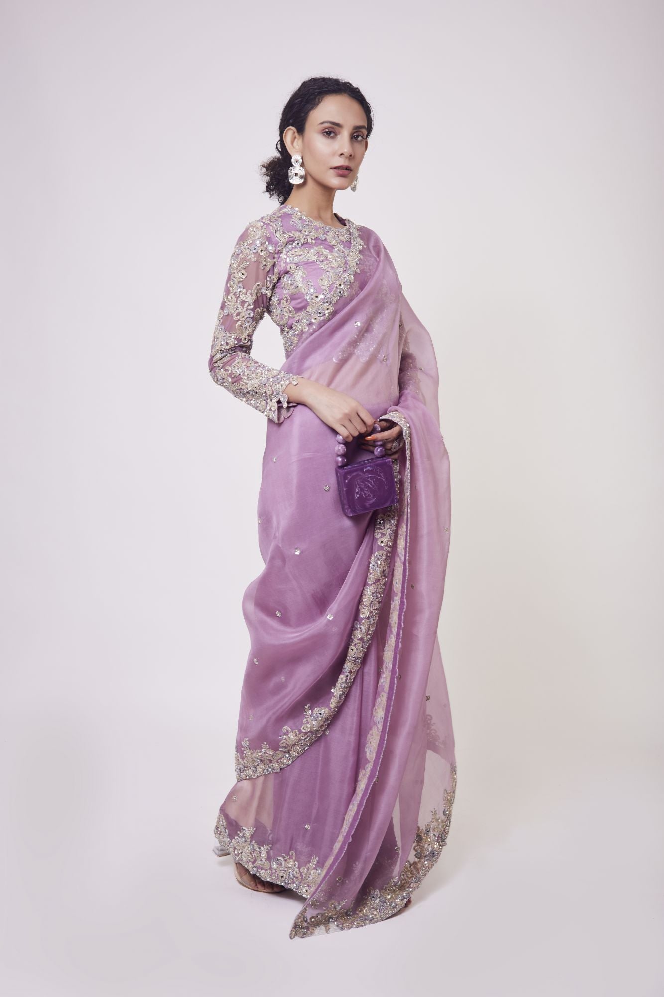 Buy lavender mirror work organza sari online in USA with blouse. Make a fashion statement on festive occasions and weddings with designer sarees, designer suits, Indian dresses, Anarkali suits, palazzo suits, designer gowns, sharara suits, embroidered sarees from Pure Elegance Indian fashion store in USA.-right