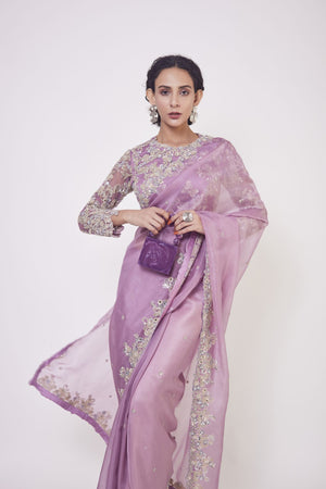 Buy lavender mirror work organza sari online in USA with blouse. Make a fashion statement on festive occasions and weddings with designer sarees, designer suits, Indian dresses, Anarkali suits, palazzo suits, designer gowns, sharara suits, embroidered sarees from Pure Elegance Indian fashion store in USA.-closeup