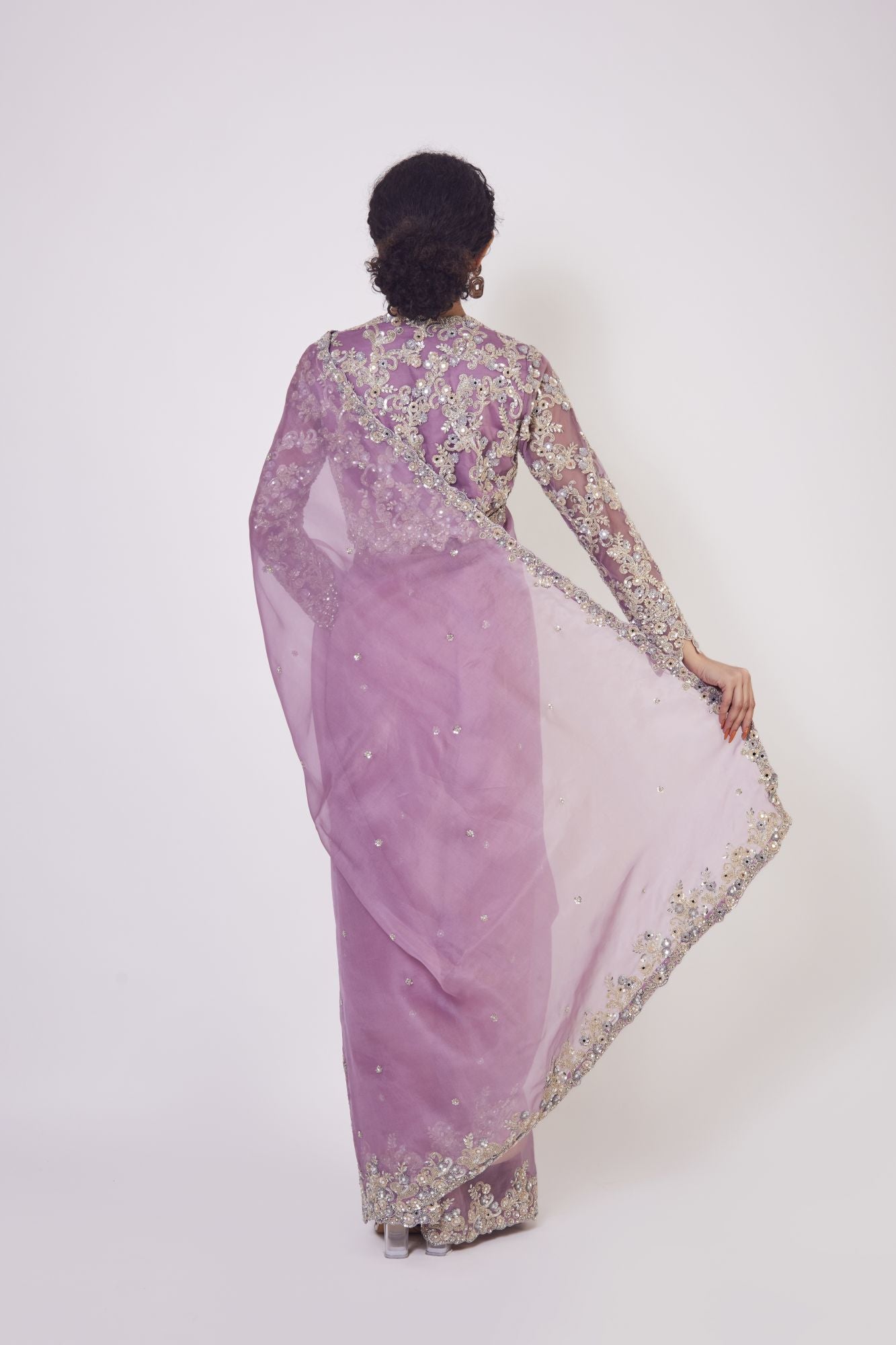 Buy lavender mirror work organza sari online in USA with blouse. Make a fashion statement on festive occasions and weddings with designer sarees, designer suits, Indian dresses, Anarkali suits, palazzo suits, designer gowns, sharara suits, embroidered sarees from Pure Elegance Indian fashion store in USA.-back