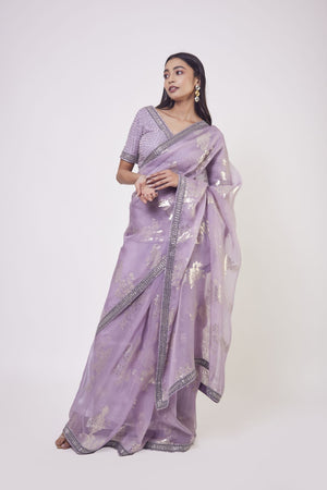 Shop lavender embroidered satin sari online in USA with blouse. Make a fashion statement on festive occasions and weddings with designer sarees, designer suits, Indian dresses, Anarkali suits, palazzo suits, designer gowns, sharara suits, embroidered sarees from Pure Elegance Indian fashion store in USA.-front