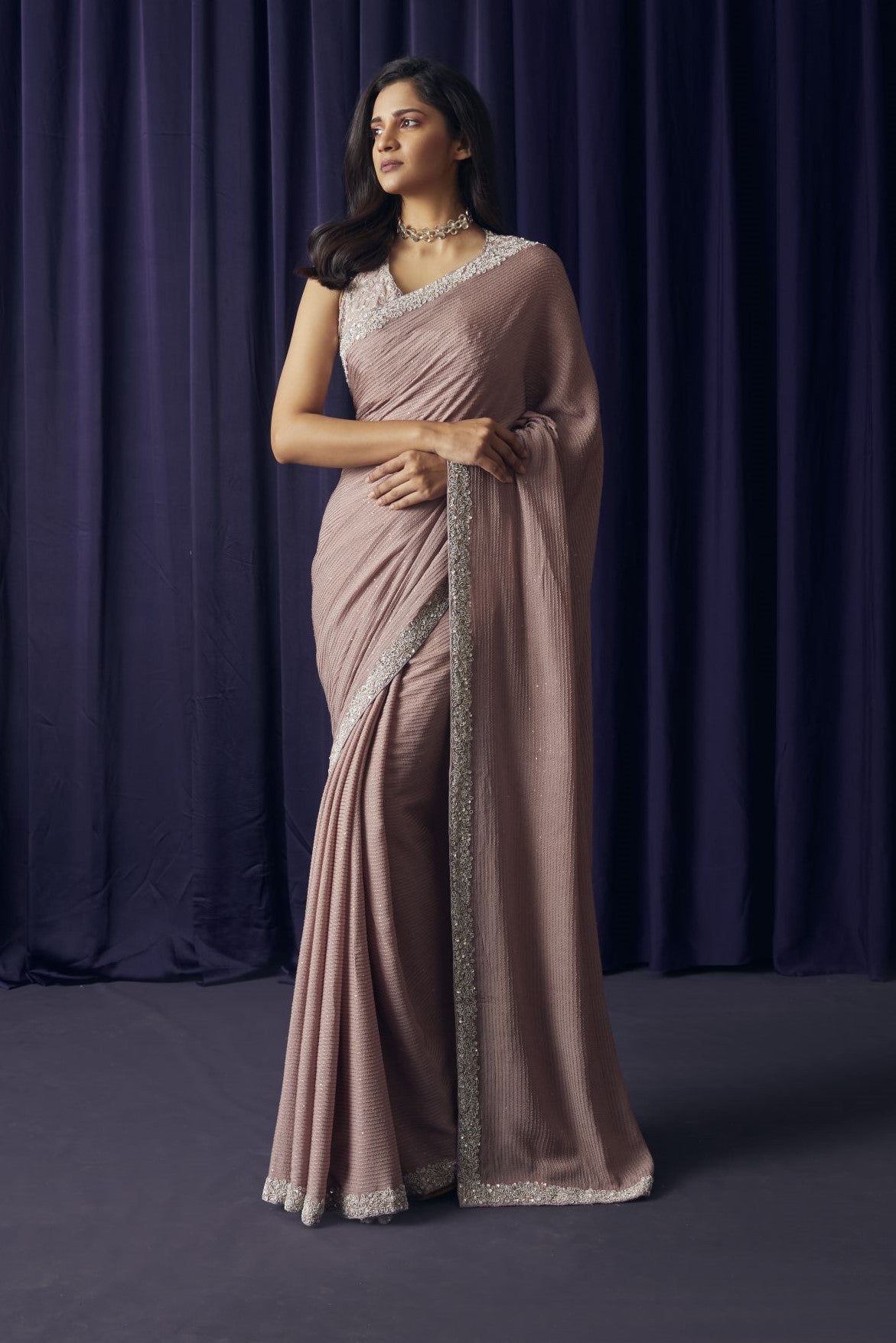 Buy beautiful onion pink embroidered silk sari online in USA with blouse. Make a fashion statement on festive occasions and weddings with designer sarees, designer suits, Indian dresses, Anarkali suits, palazzo suits, designer gowns, sharara suits, embroidered sarees from Pure Elegance Indian fashion store in USA.-full view