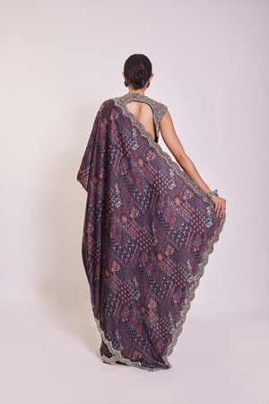 Shop beautiful wine printed embroidered satin sari online in USA with blouse. Make a fashion statement on festive occasions and weddings with designer sarees, designer suits, Indian dresses, Anarkali suits, palazzo suits, designer gowns, sharara suits, embroidered sarees from Pure Elegance Indian fashion store in USA.-back