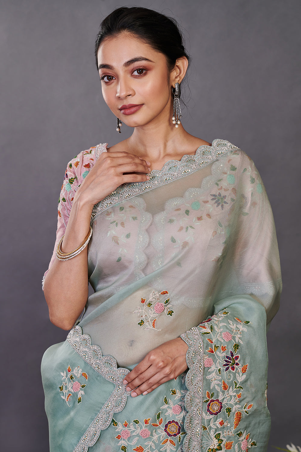 Buy sea green embroidered organza sari online in USA with blouse. Make a fashion statement on festive occasions and weddings with designer sarees, designer suits, Indian dresses, Anarkali suits, palazzo suits, designer gowns, sharara suits, embroidered sarees from Pure Elegance Indian fashion store in USA.-closeup