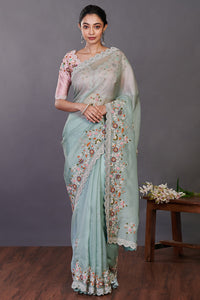 Buy sea green embroidered organza sari online in USA with blouse. Make a fashion statement on festive occasions and weddings with designer sarees, designer suits, Indian dresses, Anarkali suits, palazzo suits, designer gowns, sharara suits, embroidered sarees from Pure Elegance Indian fashion store in USA.-full view
