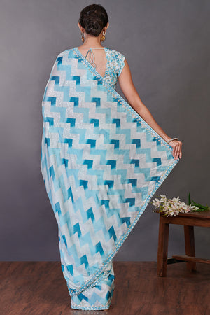 Buy aqua blue printed satin sequin work sari online in USA with blouse. Make a fashion statement on festive occasions and weddings with designer sarees, designer suits, Indian dresses, Anarkali suits, palazzo suits, designer gowns, sharara suits, embroidered sarees from Pure Elegance Indian fashion store in USA.-back