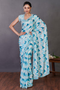 Buy aqua blue printed satin sequin work sari online in USA with blouse. Make a fashion statement on festive occasions and weddings with designer sarees, designer suits, Indian dresses, Anarkali suits, palazzo suits, designer gowns, sharara suits, embroidered sarees from Pure Elegance Indian fashion store in USA.-full view