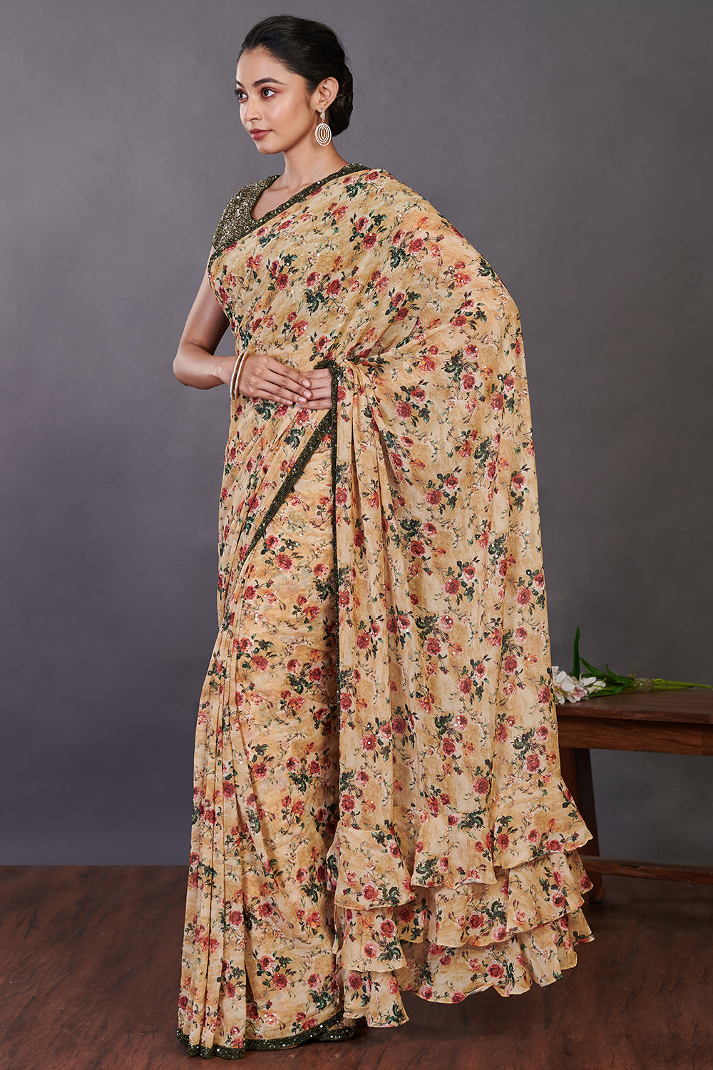 Buy yellow floral print ruffle georgette sari online in USA with green blouse. Make a fashion statement on festive occasions and weddings with designer sarees, designer suits, Indian dresses, Anarkali suits, palazzo suits, designer gowns, sharara suits, embroidered sarees from Pure Elegance Indian fashion store in USA.-pallu