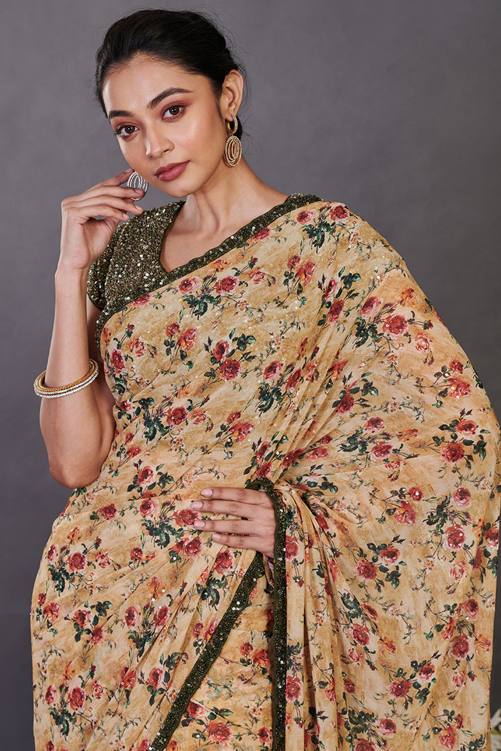 Buy yellow floral print ruffle georgette sari online in USA with green blouse. Make a fashion statement on festive occasions and weddings with designer sarees, designer suits, Indian dresses, Anarkali suits, palazzo suits, designer gowns, sharara suits, embroidered sarees from Pure Elegance Indian fashion store in USA.-closeup