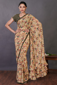 Buy yellow floral print ruffle georgette sari online in USA with green blouse. Make a fashion statement on festive occasions and weddings with designer sarees, designer suits, Indian dresses, Anarkali suits, palazzo suits, designer gowns, sharara suits, embroidered sarees from Pure Elegance Indian fashion store in USA.-full view