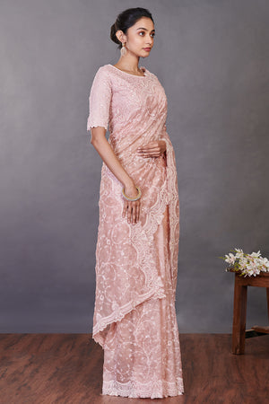 Shop dusty pink embroidered tissue silk sari online in USA with blouse. Make a fashion statement on festive occasions and weddings with designer sarees, designer suits, Indian dresses, Anarkali suits, palazzo suits, designer gowns, sharara suits, embroidered sarees from Pure Elegance Indian fashion store in USA.-side