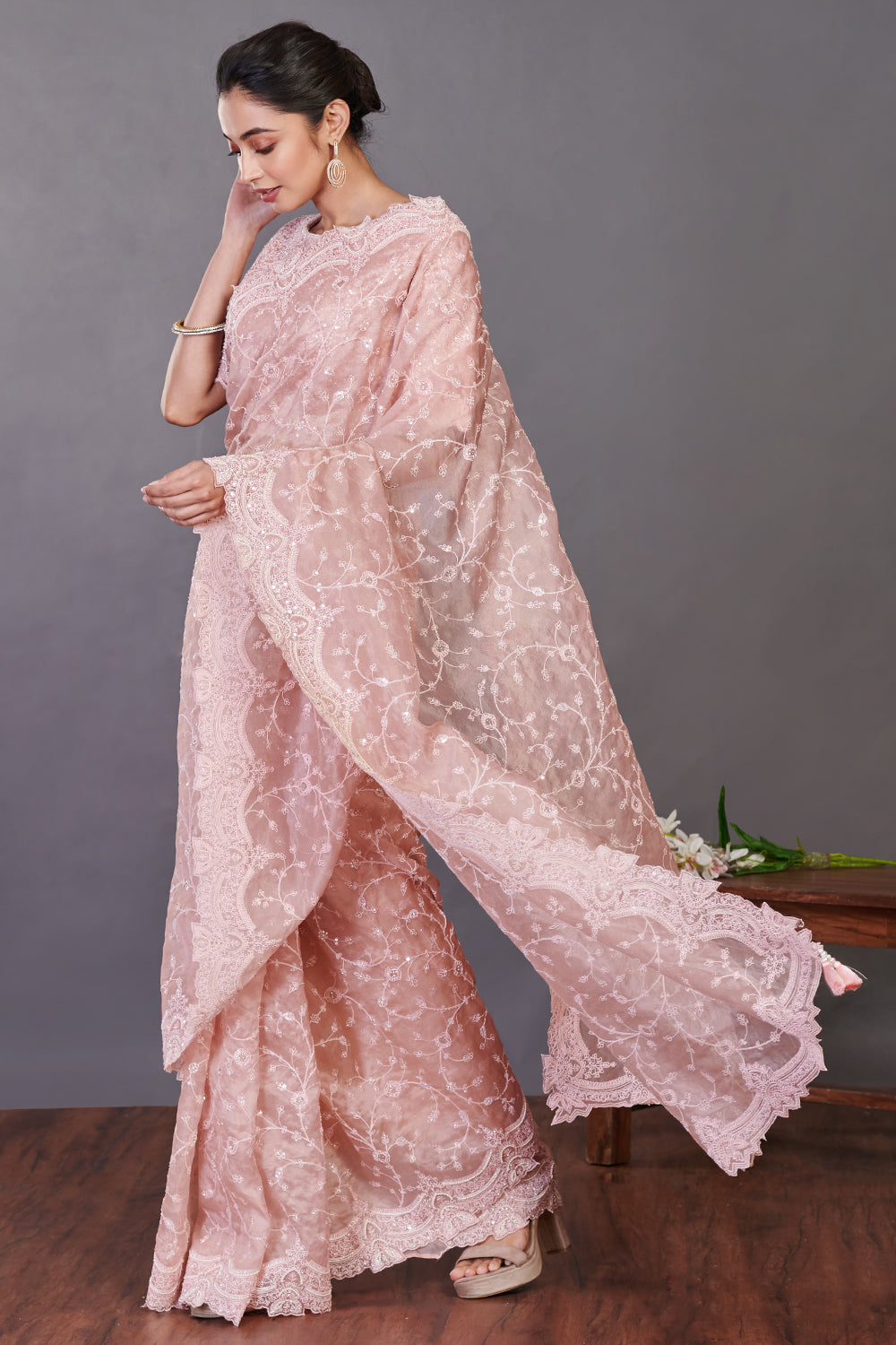 Shop dusty pink embroidered tissue silk sari online in USA with blouse. Make a fashion statement on festive occasions and weddings with designer sarees, designer suits, Indian dresses, Anarkali suits, palazzo suits, designer gowns, sharara suits, embroidered sarees from Pure Elegance Indian fashion store in USA.-pallu