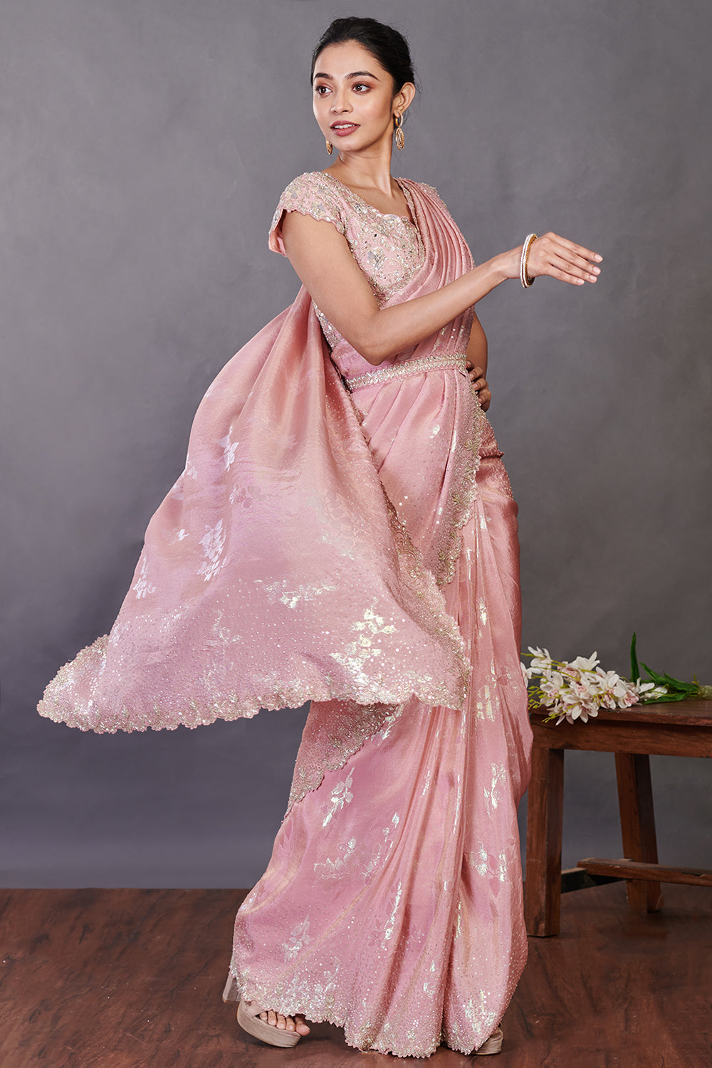 Buy beautiful dusty pink embroidered tissue silk sari online in USA with belt. Make a fashion statement on festive occasions and weddings with designer sarees, designer suits, Indian dresses, Anarkali suits, palazzo suits, designer gowns, sharara suits, embroidered sarees from Pure Elegance Indian fashion store in USA.-right