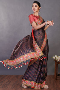 Shop beautiful black printed satin sari online in USA with kasab work. Make a fashion statement on festive occasions and weddings with designer sarees, designer suits, Indian dresses, Anarkali suits, palazzo suits, designer gowns, sharara suits, embroidered sarees from Pure Elegance Indian fashion store in USA.-full view