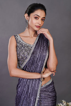 Shop deep purple satin printed sequin work sari online in USA with belt. Make a fashion statement on festive occasions and weddings with designer sarees, designer suits, Indian dresses, Anarkali suits, palazzo suits, designer gowns, sharara suits, embroidered sarees from Pure Elegance Indian fashion store in USA.-closeup